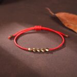 Five Lucky Beads Copper Bracelet - Blue & Red String - Image 2