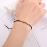 Five Lucky Beads Copper Bracelet - Blue & Red String - Image 3